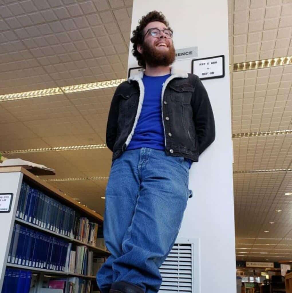 student in library